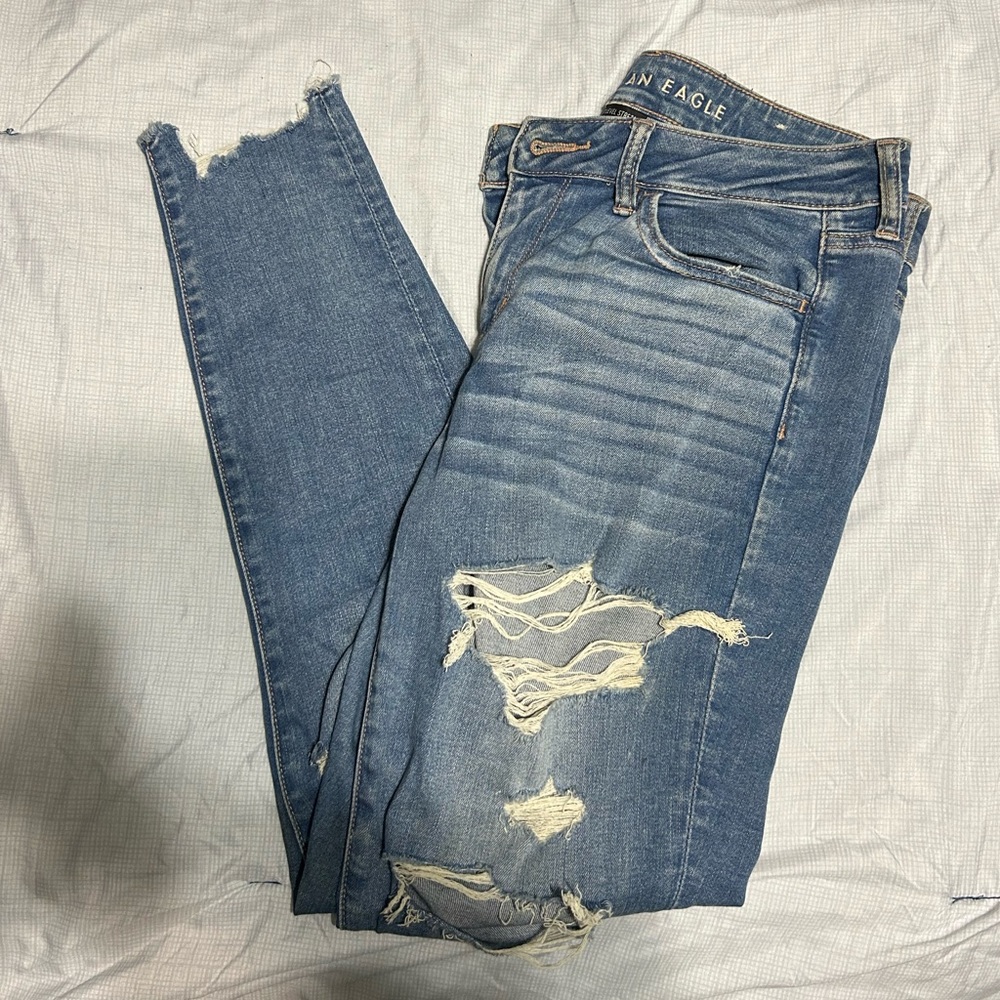 American Eagle Skinny Jeans w/ distressed ankle